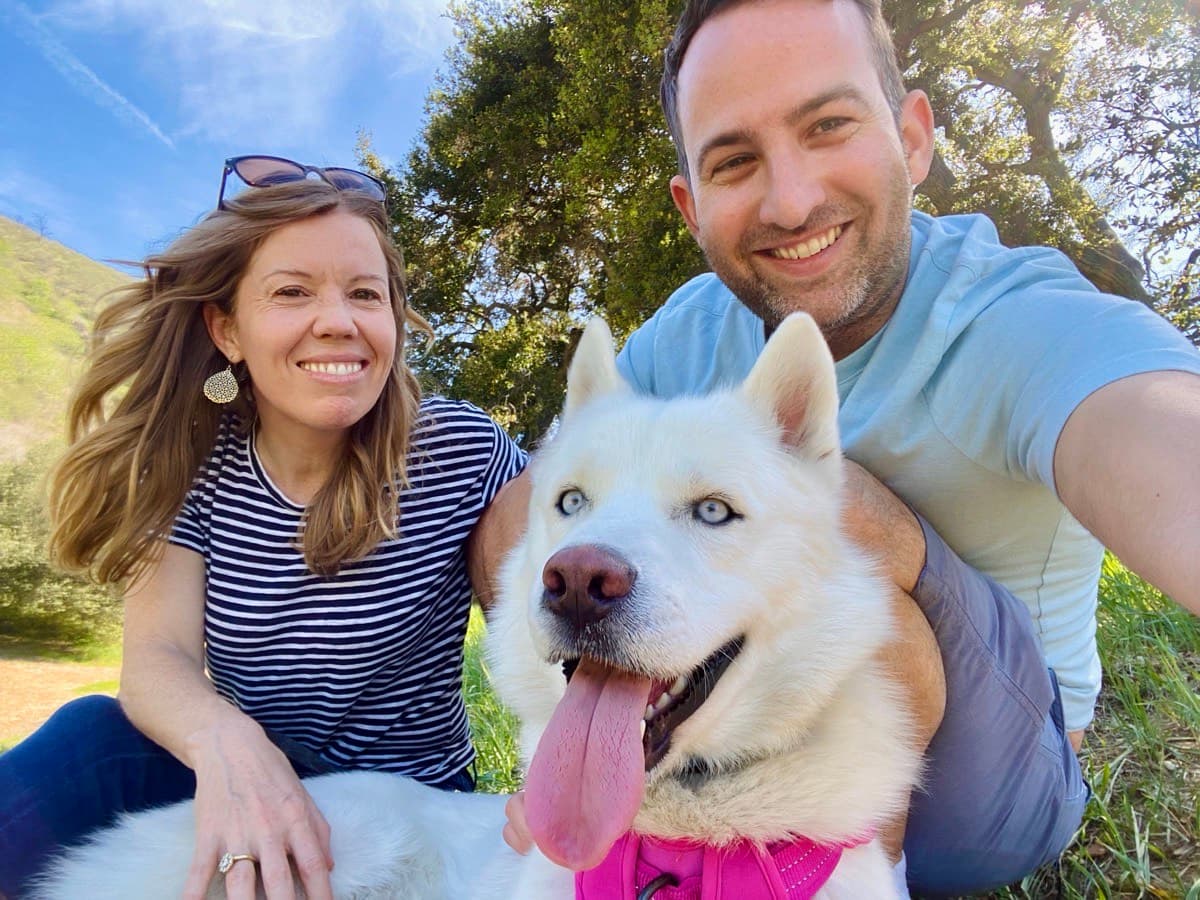 Eric, Dr. Zoë, and Fenix outdoors